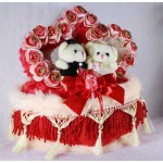 Beautiful Love Couple Teddy Bears Sitting on a Decorated Heart Cushion